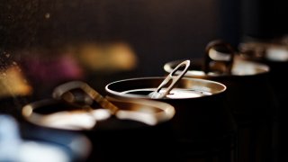 Close-up view of the top of beer cans