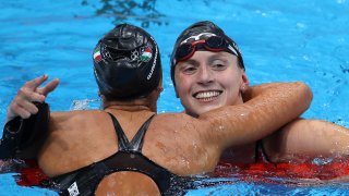 Katie Ledecky is congratulated by Simona Quadarella after winning her latest Olympic gold medal