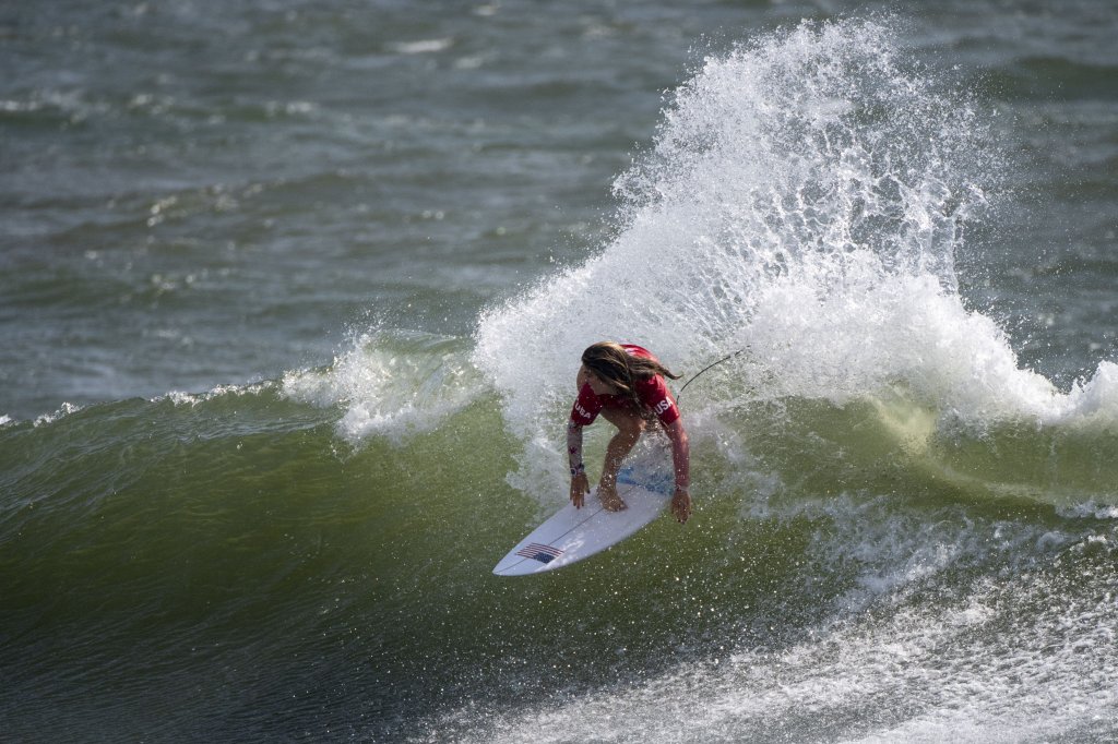 USA's Caroline Marks rides a wave during the women's Surfing Third round at the Tsurigasaki Surfing Beach, in Chiba, on July 26, 2021, during the Tokyo 2020 Olympic Games.