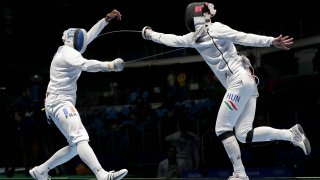 Aug 14, 2016; Rio de Janeiro, Brazil; Yannick Borel (FRA) competes against Andras Redli (HUN) in the men's epee team gold medal match at Carioca Arena 3 during the Rio 2016 Summer Olympic Games.