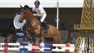 Australia's Jamie Kermond, riding Yandoo Oaks Constellation, competes to win the High Jumping event of the second edition of the Longines Paris Eiffel Jumping tournament on the Champ de Mars in Paris on July 3, 2015.