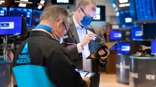 Traders at the New York Stock Exchange.