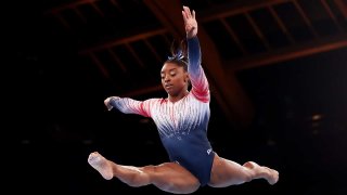 Simone Biles competes in the women's balance beam final at the 2020 Tokyo Olympic Games.