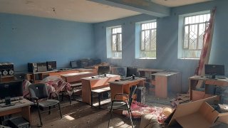 A damaged school is seen after airstrikes in Lashkar Gah city of Helmand province, southern of Kabul, Afghanistan