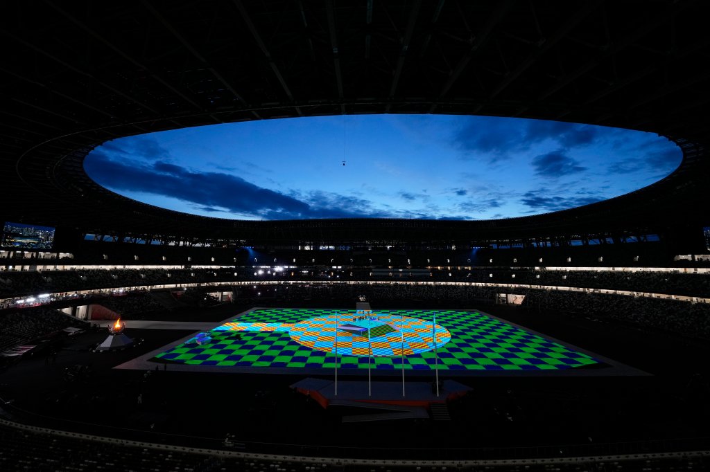 Lights illuminate the field in the Olympic Stadium prior to the start of the closing ceremony at the 2020 Summer Olympics, Sunday, Aug. 8, 2021, in Tokyo, Japan.