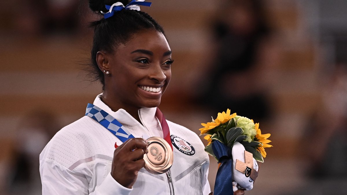 How Simone Biles’ Total Olympic Medal Count Compares to Records NBC10