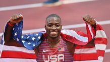 Silver medalist Grant Holloway of Team USA celebrates winning silver for the Men's 110m Hurdles Final at the Tokyo 2020 Olympic Games at Olympic Stadium in Tokyo, Japan on Aug. 5, 2021.