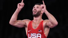 Team USA's Thomas Patrick Gilman celebrates his victory against Iran's Reza Atrinagharchi in their men's freestyle 57kg wrestling bronze medal match during the Tokyo 2020 Olympic Games at the Makuhari Messe in Tokyo on Aug. 5, 2021.