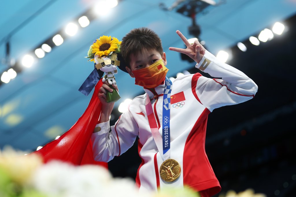 Gold medalist Hongchan Quan of Team China celebrates during the medal ceremony for the Women's 10m Platform Final on day thirteen of the Tokyo 2020 Olympic Games at Tokyo Aquatics Centre on Aug. 5, 2021 in Tokyo, Japan. 