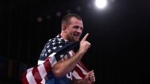 David Morris Taylor III of Team United States celebrates his victory over Hassan Yazdanicharati of Team Iran during the Men's Freestyle 86kg Final on day thirteen of the Tokyo Olympic Games at Makuhari Messe Hall on Aug. 5, 2021 in Chiba, Japan.