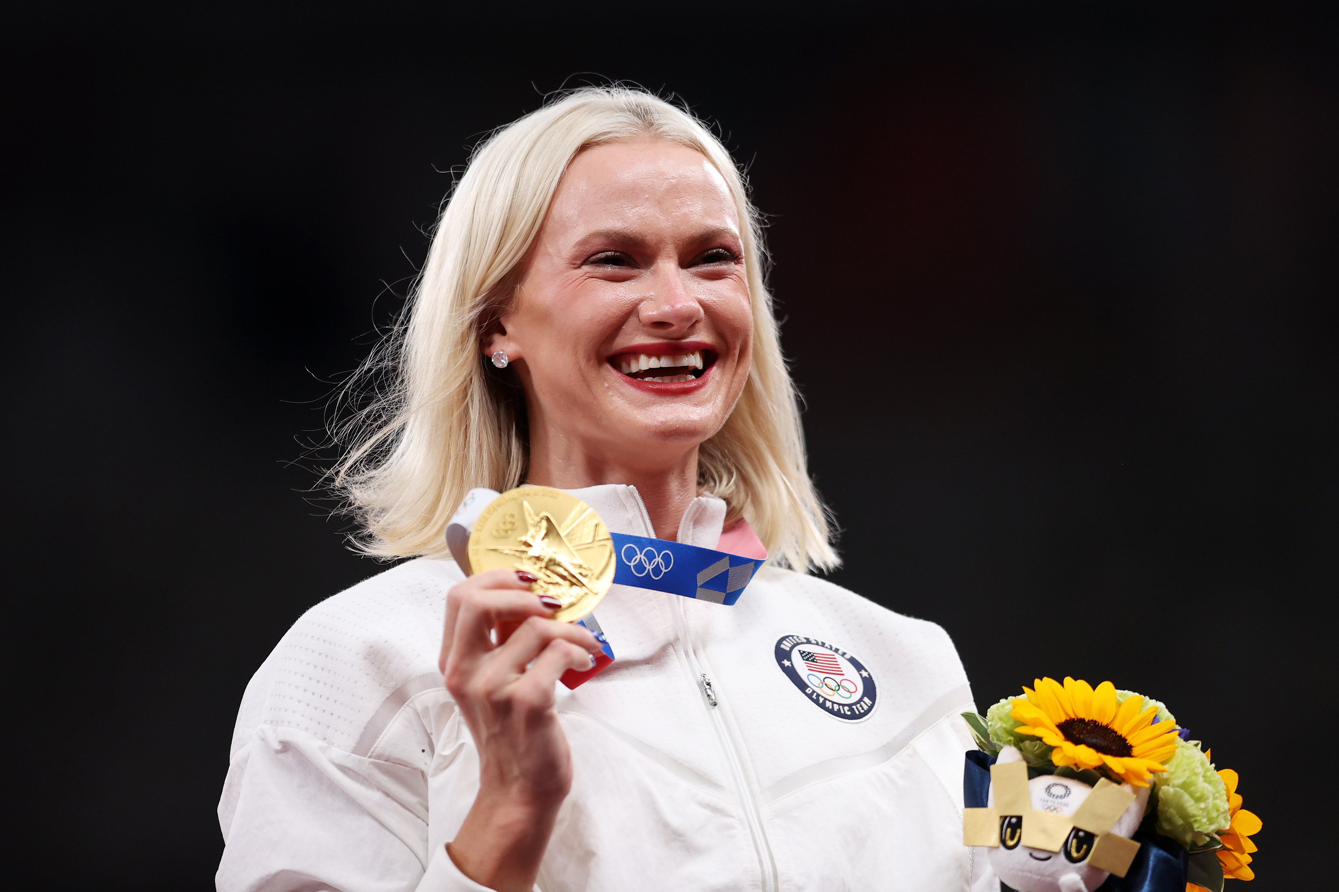 Gold medalist Katie Nageotte of Team USA holds her gold medal on the podium during the medal ceremony for the Women's Pole Vault on day fourteen of the Tokyo Olympic Games at Olympic Stadium on Aug. 6, 2021, in Tokyo, Japan.