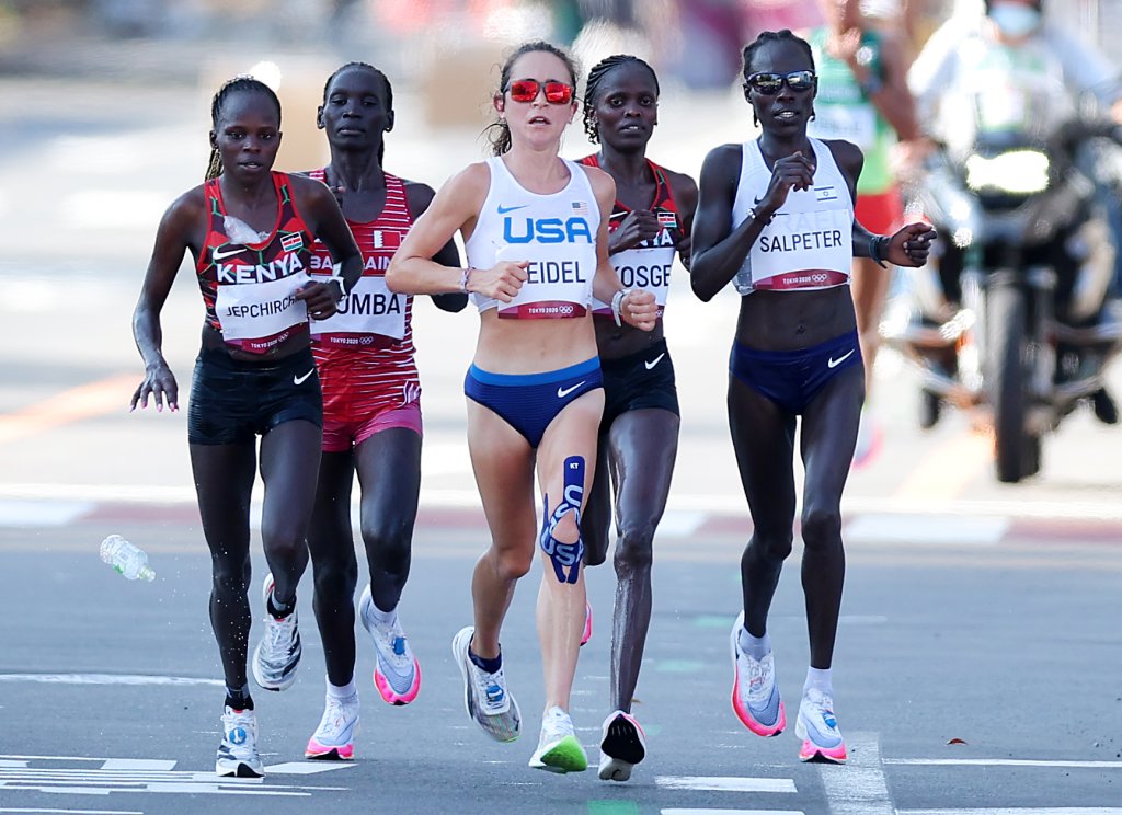 Peres Jepchirchir of Team Kenya, Eunice Chebichii Chumba of Team Bahrain, Molly Seidel of Team United States, Brigid Kosgei of Team Kenya and Lonah Chemtai Salpeter of Team Israel compete in the Women's Marathon Final on day 15 of the Tokyo 2020 Olympic Games at Kasumigaseki Country Club on Aug. 7, 2021, in Kawagoe, Japan.