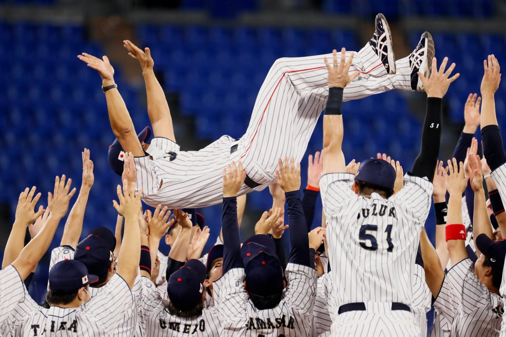 Team Japan celebrates during the gold medal game between Team USA and Team Japan on day fifteen of the Tokyo 2020 Olympic Games at Yokohama Baseball Stadium on Aug. 7, 2021 in Yokohama, Kanagawa, Japan.