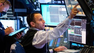 Traders on the floor of the New York Stock Exchange (NYSE) in New York, on Wednesday, Aug. 11, 2021.