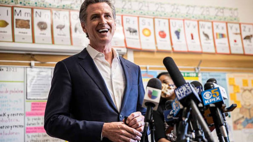 California Governor Gavin Newsom speaks to members of the media after meeting students at Melrose Leadership Academy during a school visit in Oakland, California on Wednesday, Sept. 15, 2021.