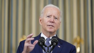 President Joe Biden speaks from the State Dining Room of the White House