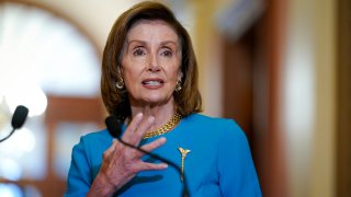 Speaker of the House Nancy Pelosi, D-Calif., talks to reporters as she welcomes Australian Prime Minister Scott Morrison, at the Capitol in Washington, Wednesday, Sept. 22, 2021. The House has approved legislation to fund the government, suspend its borrowing limit and provide federal disaster and refugee aid but Republicans in the Senate are expected to block the measure.