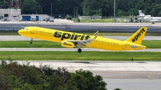 A Spirit Airlines aircraft takes off at Orlando International Airport.