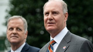 Southwest Airlines Chairman and CEO Gary Kelly (R) speaks alongside American Airlines chairman and CEO Doug Parker (L) following a meeting with other airline executives at the White House about extending economic assistance to the airlines, in Washington, DC, September 17, 2020.