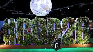 A giant model of earth is seen in a meeting hall during the UN Climate Change Conference (COP26) in Glasgow, Scotland, Britain, November 2, 2021.