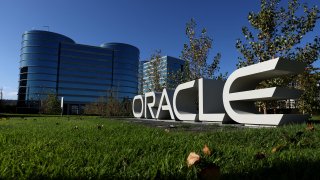 A sign is posted in front of Oracle headquarters on December 09, 2021 in Redwood Shores, California.