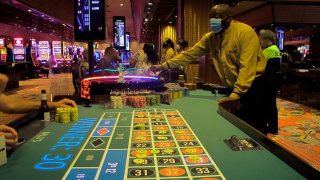 A dealer conducts a game of roulette in Bally's casino in Atlantic City, N.J.