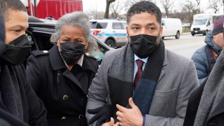 Actor Jussie Smollett arrives Monday, Dec. 6, 2021, with his mother Janet at the Leighton Criminal Courthouse for day five of his trial in Chicago. Smollett is accused of lying to police when he reported he was the victim of a racist, anti-gay attack in downtown Chicago nearly three years ago, in Chicago.