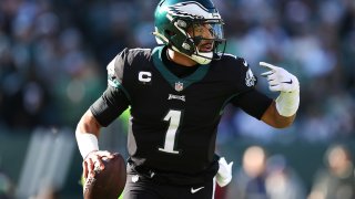 Jalen Hurts #1 of the Philadelphia Eagles scrambles with the ball during the first half against the New York Giants at Lincoln Financial Field
