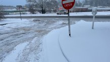 Snow sticks to a "do not enter" sign in Clifton Heights, Pa.