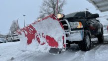 Snow sticks to a plow.