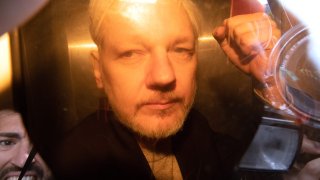 WikiLeaks founder Julian Assange arrives at court in London on May 1, 2019 to be sentenced for bail violation.