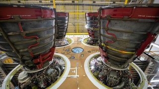 Four Aerojet Rocketdyne RS-25 engines attached to the core Stage for NASA’s Space Launch System rocket.