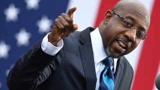 Democratic Senate candidate Reverend Raphael Warnock speaks during a campaign rally in Atlanta, Georgia on December 15, 2020.