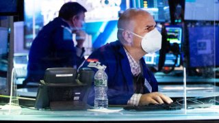 Traders on the floor of the New York Stock Exchange, Jan. 12, 2022.