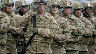 U.S. army soldiers stand in formation during a joint military tactical training exercise Blowback 2016 with Bulgaria’s army at Novo Selo military ground on April 11, 2016.