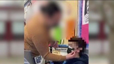 Parents Demand Answers Over Photo of Teacher Taping Mask on Student
