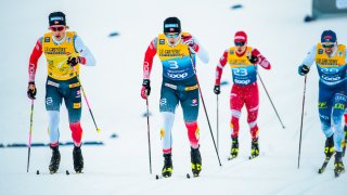 Johannes Hoesflot Klaebo of Norway, Erik Valnes of Norway compete during the Individual Sprint at the FIS World Cup Cross-Country Oberstdorf on