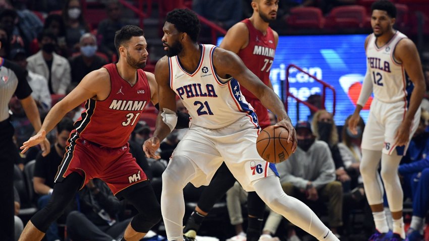 Philadelphia basketball star Joel Embiid playing against the Miami Heat