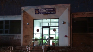 The front of the Philadelphia Police Department's internal affairs bureau. It has glass doors and a sign above the doors that reads "Philadelphia Police Internal Affairs Bureau."