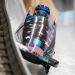 Kaillie Humphries, of United States, drives during the Women's Monobob heat 1 at the 2022 Winter Olympics, Feb. 13, 2022, in the Yanqing district of Beijing, China.