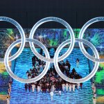 Flag bearers Brittany Bowe and John Shuster of Team USA carry their flag during the Opening Ceremony of the Beijing 2022 Winter Olympics at the Beijing National Stadium on Feb. 4, 2022 in Beijing, China.