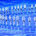 Performers hold up snowflakes with the names of participating countries in front of the large Olympic Rings during the Opening Ceremony of the Beijing 2022 Winter Olympics at the Beijing National Stadium on Feb. 4, 2022, in Beijing, China.