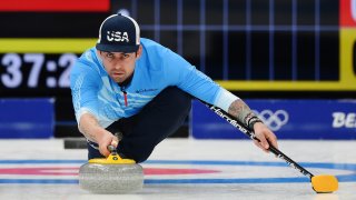 Christopher Plys of Team United States compete against Team China during the Men's Curling Round Robin at the 2022 Winter Olympics, Feb. 13, 2022, in Beijing.