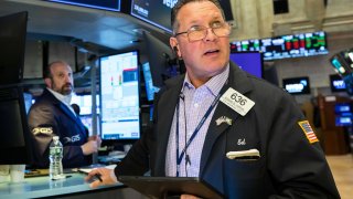 Traders on the floor of the NYSE, March 29, 2022.