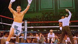 Hector Camacho exults as referee Joe Cortez stops the fight with "Sugar" Ray Leonard in the fifth round in Atlantic City, N.J.