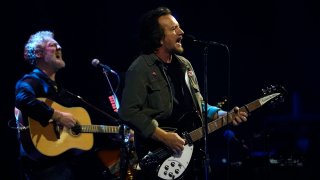 Eddie Vedder, right, performs alongside guitarist Glen Hansard during a concert by Eddie Vedder and The Earthlings, Friday, Feb. 25, 2022, at the YouTube Theater in Inglewood, Calif.