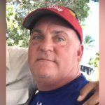 Jim Hunt wears a cap