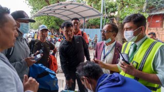 A team of climbers prepare to leave for rescue operations from the Tribhuvan International Airport in Kathmandu, Nepal, Sunday, May 29, 2022.