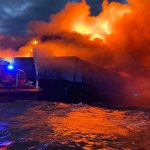 The barge burns in Delaware Bay on May 23, 2022