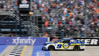 NASCAR driver Chase Elliott crosses the finish line to win the NASCAR Cup Series DuraMAX Drydene 400 presented by RelaDyne at Dover Motor Speedway
